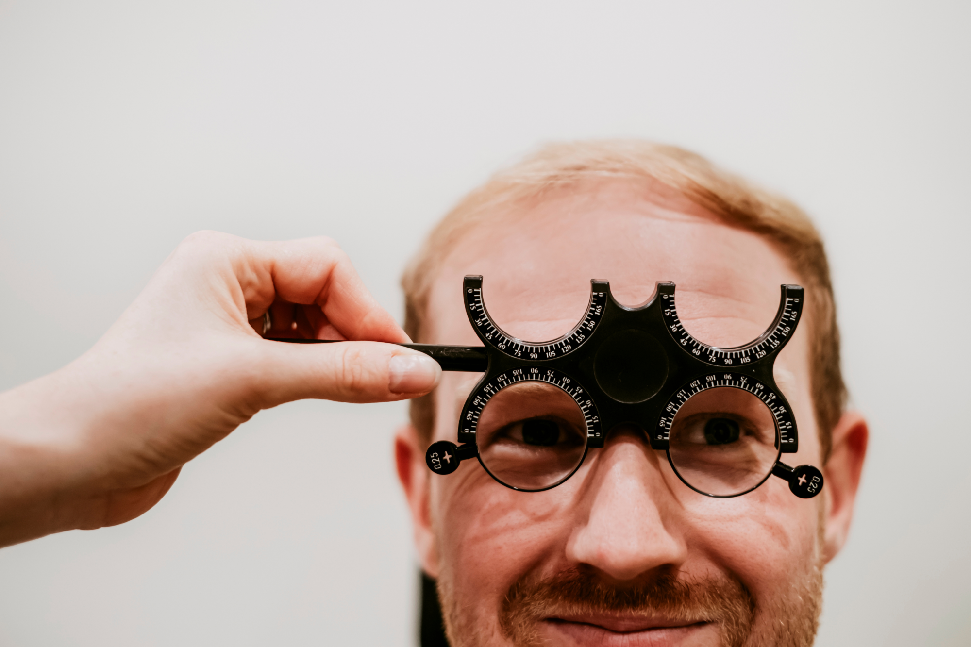 Refraction testing during an eye exam to assess vision changes and support early detection of eye diseases, including glaucoma.