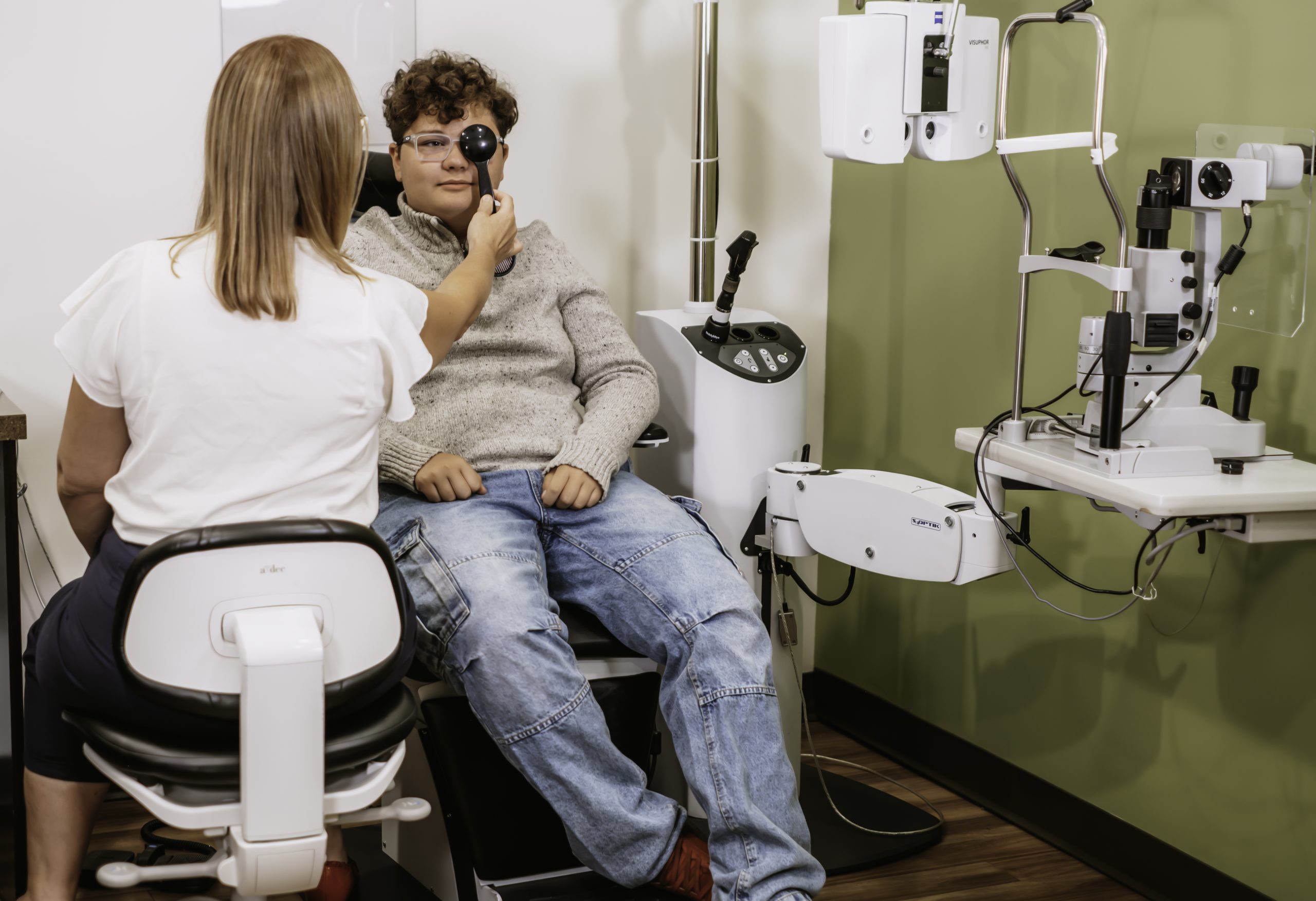 Grande Prairie optometrist during a children's eye exam at Aurora Eye Care